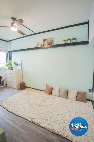 The simple and serene spare bedroom is graced by a thick handmade rug, gifted by a friend