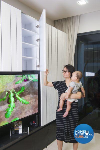 The TV console encloses more concealed storage space