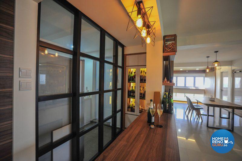 A wooden counter fronts the kitchen, echoing the clean straight lines of the home