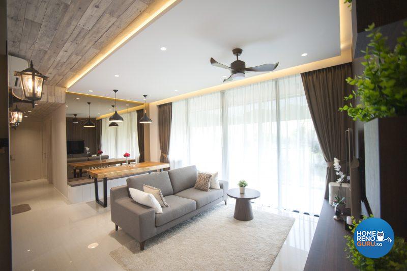 The wood-lookalike wallpaper on the ceiling heightens the cosy, rustic feel of the living area