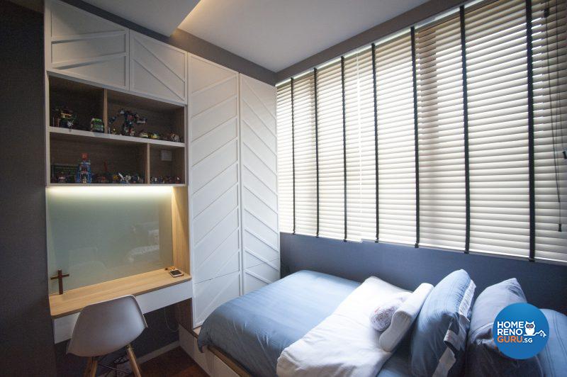 The older son’s room features distinctive white wooden panelling over the built-in closet and overhead storage space