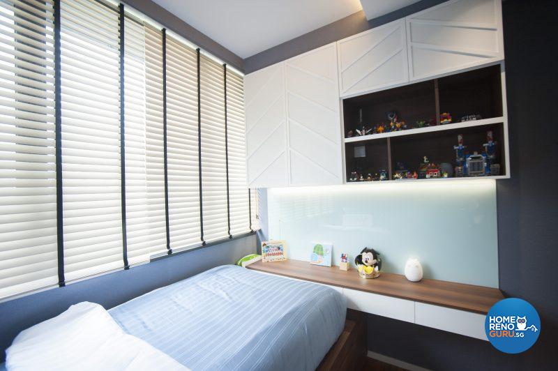 The younger son’s room features the same white panelling in his brother’s room, only in a different configuration