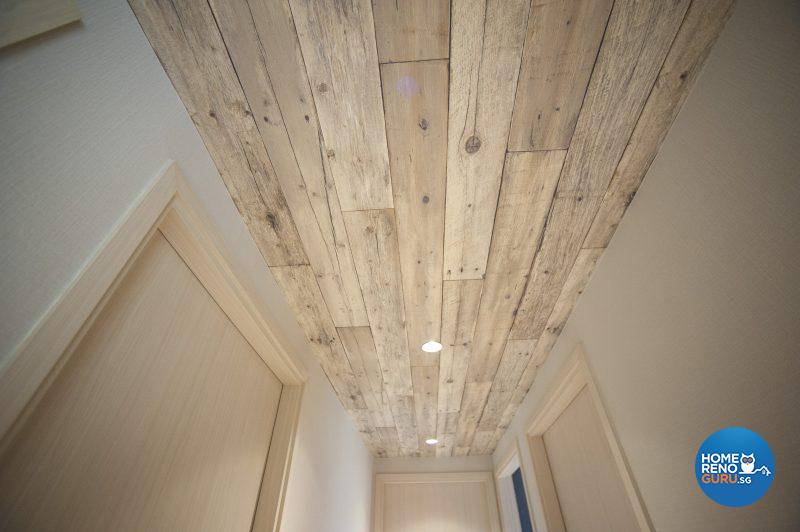 The feature ceiling continues down the hallway and connects all of the main spaces within the home