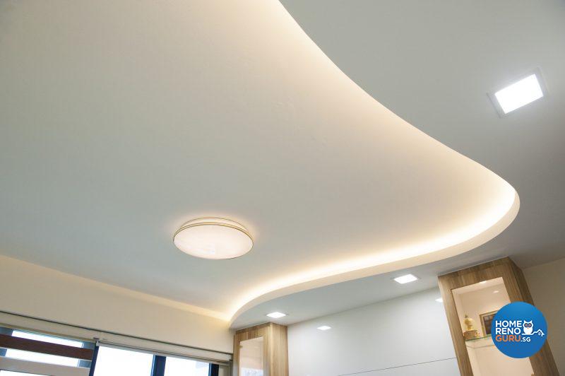 The distinctive curve in the living area ceiling conceals mood-setting cove lighting