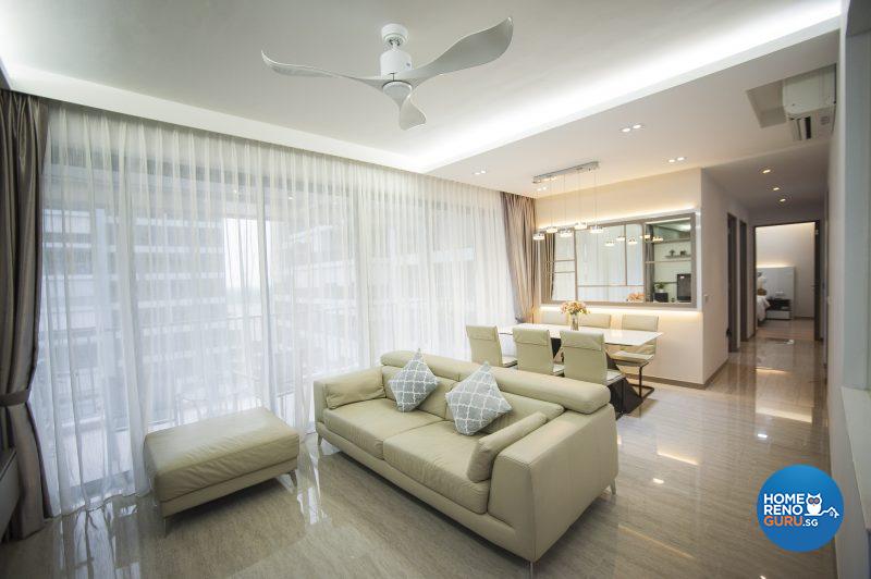 The comfortable living area, cloaked in neutrals and bathed in light