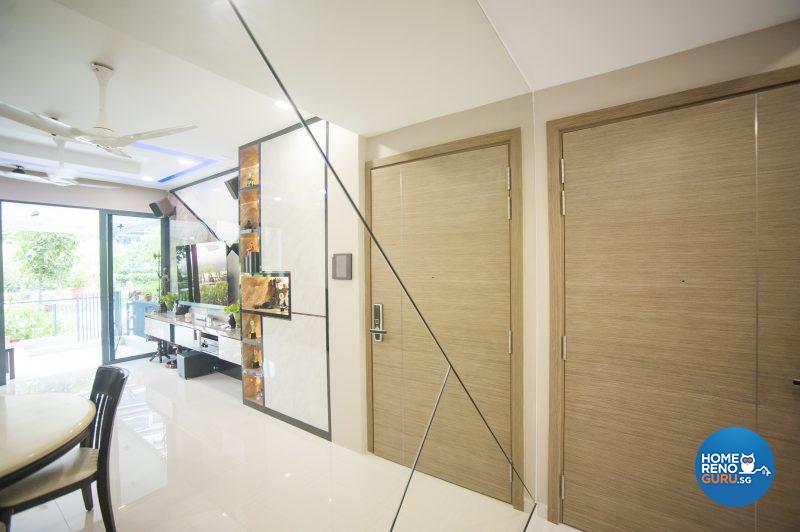 Both the feature wall behind the TV console and the mirrored panel feature a distinctive criss-cross pattern