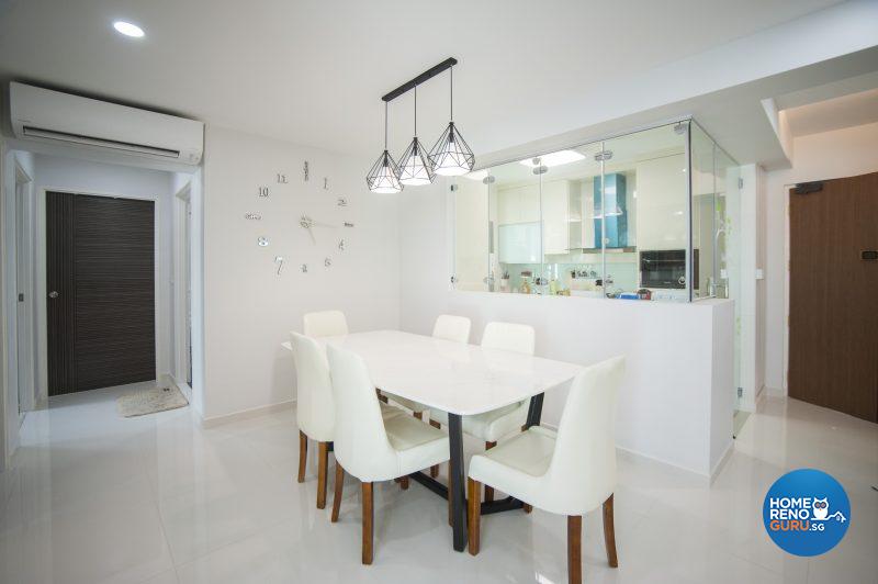 A glass-panelled kitchen looks out onto the dining area
