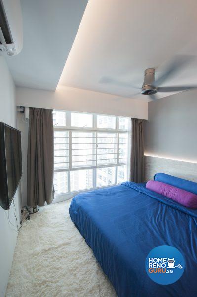 The master bedroom is lined with floor-to-ceiling windows and gently illuminated with cove lighting