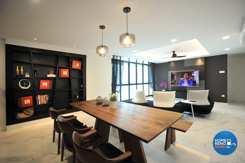 The bold, black quirky bookshelf and TV console are the dual focal points in Chien’s uncluttered living hall