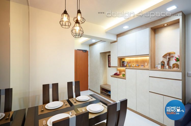 Dining room with unique frame for lightbulbs and brown tables and chairs