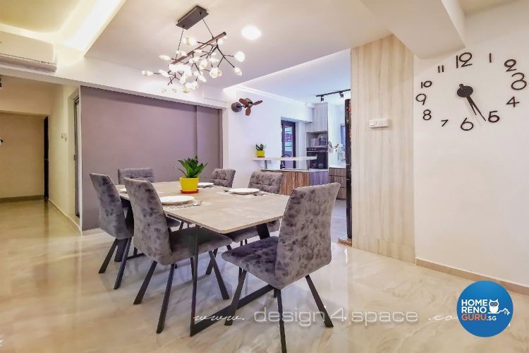 Grey chairs and beige table with special hanging lights