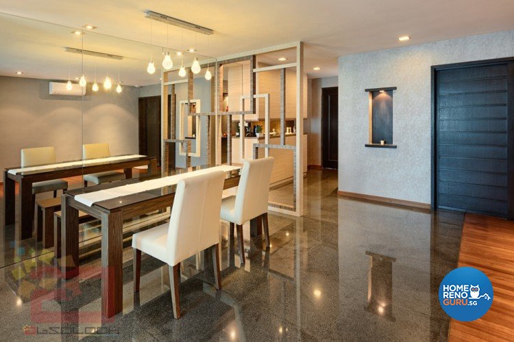 Dining room with white chairs and brown table and wall separator with overlapping rectangles