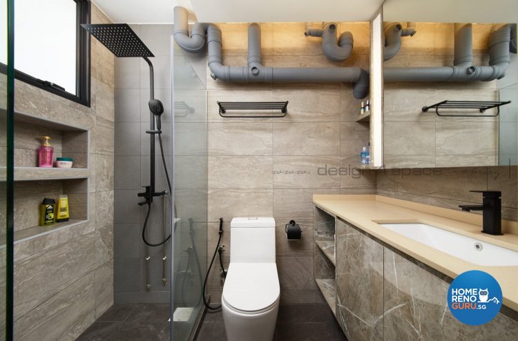 Rain shower, white toilet bowl and brown sink counter
