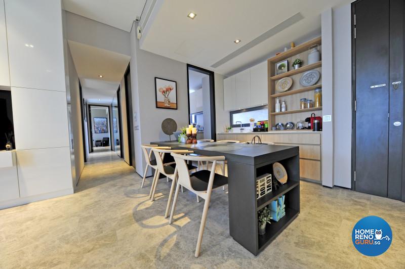 The open plan dry kitchen is semi-divided by a counter