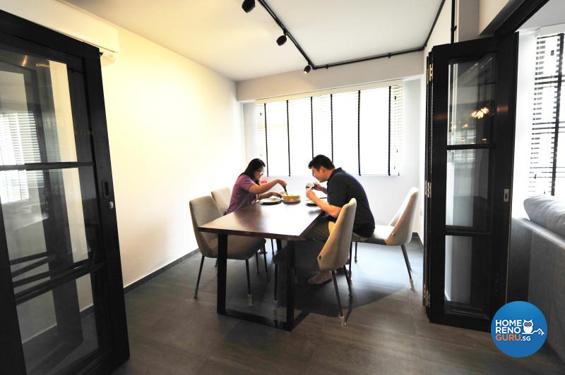 The former study was opened up and now serves as a dining cum work area