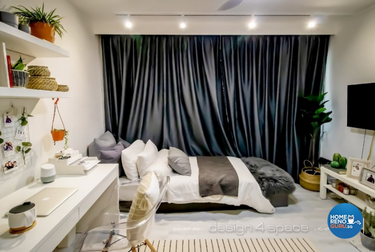 Bedroom with black curtains and study table