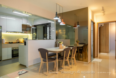 Dining area in front of kitchen with glass window