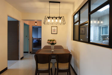 Dining area with 4 -seater wooden table and chairs