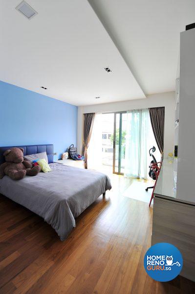 The eldest son’s bedroom enlivened by a blue feature wall