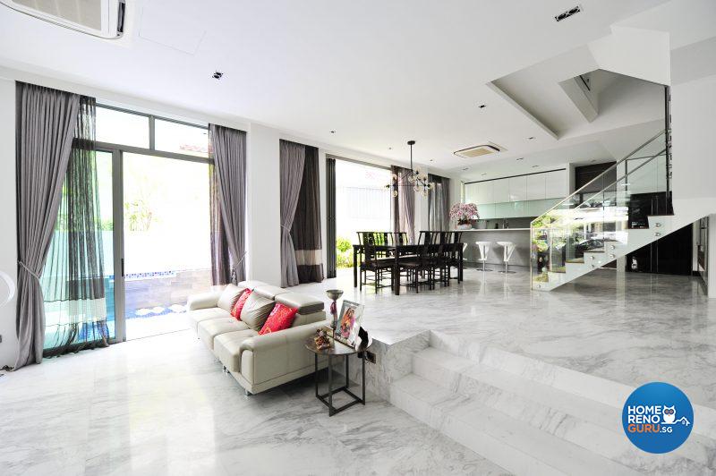 Abundant natural light fills the living area from floor-to-ceiling windows