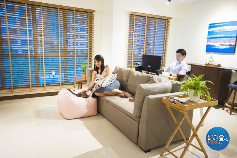 Sharon relaxing with a furry friend in the living area – her favourite spot