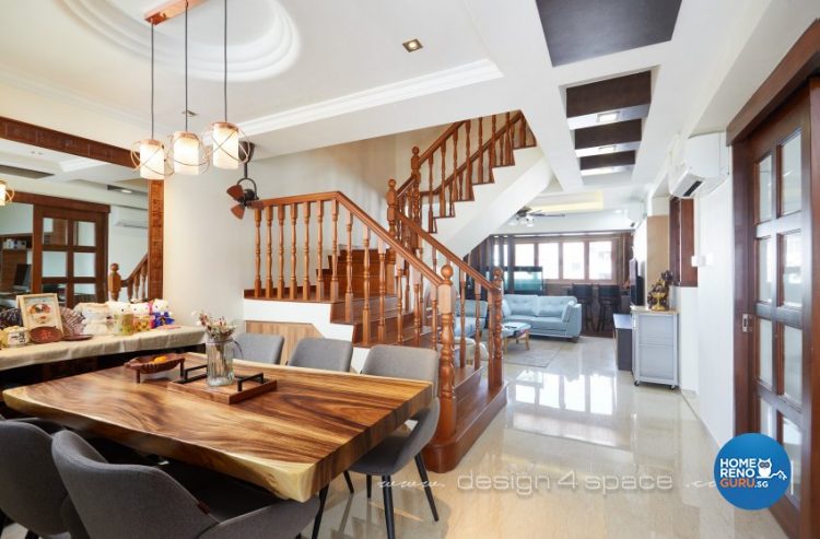 Dining room with stairs and wooden railings