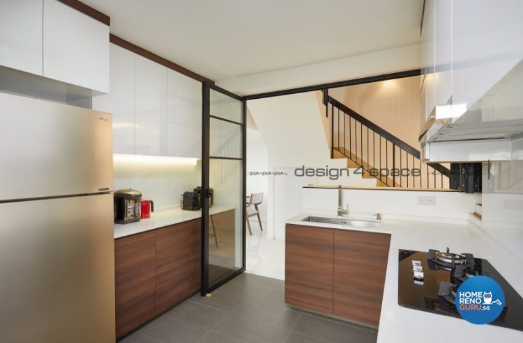 View of the kitchen with stairs in the background