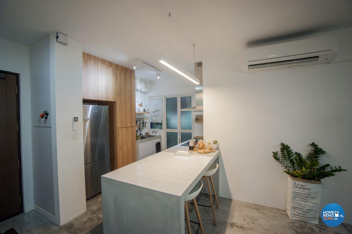 A kitchen counter doubles as casual seating and room divider