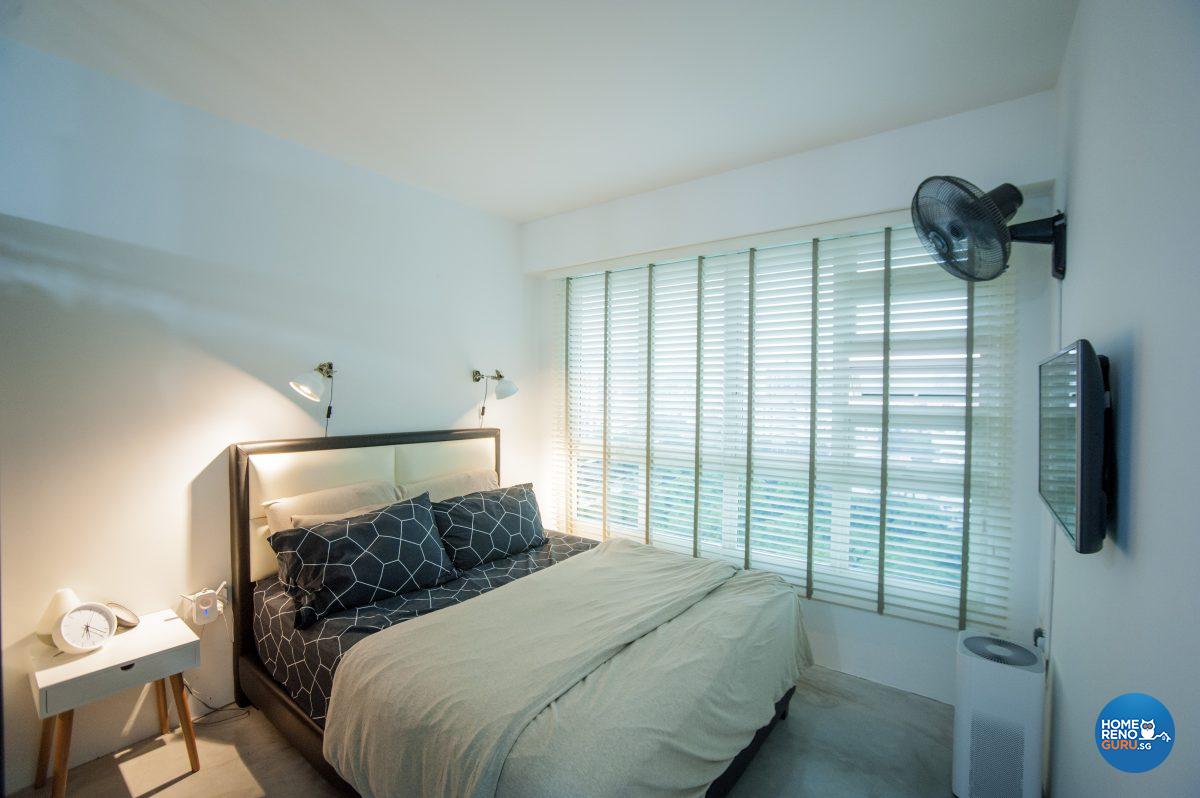 Layered lighting cloaks the master bedroom in soft light