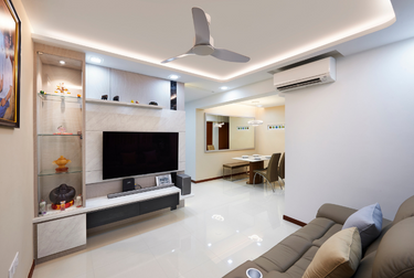 Wall-mounted TV with ceiling fan and TV console