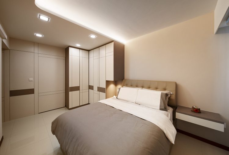 Luxury bedroom with L-shaped wardrobe