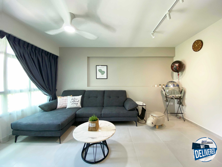 Minimalist living room with dark blue sofa and curtains