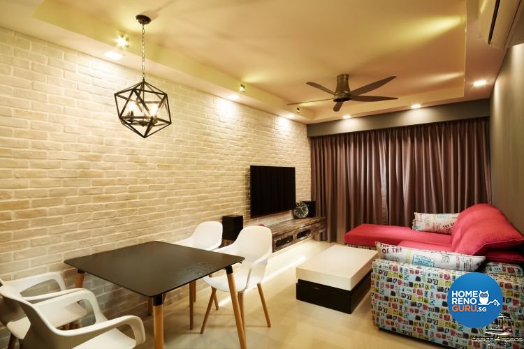 Contemporary themed living room with red sofa