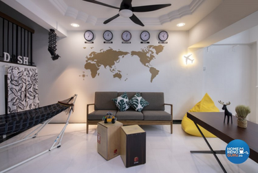 Living room with a world map and clocks for different time zones on the wall