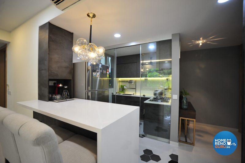 A statement lamp adds a touch of glamour over the dining area, which faces the completely rebuilt open concept kitchen