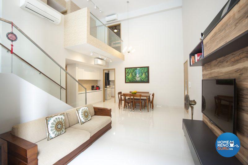 The spacious downstairs living area has a resort-like feel with clean white surfaces and wooden furnishings