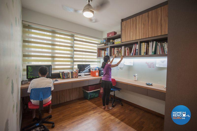 The study for the older children retains the original built-in cupboards